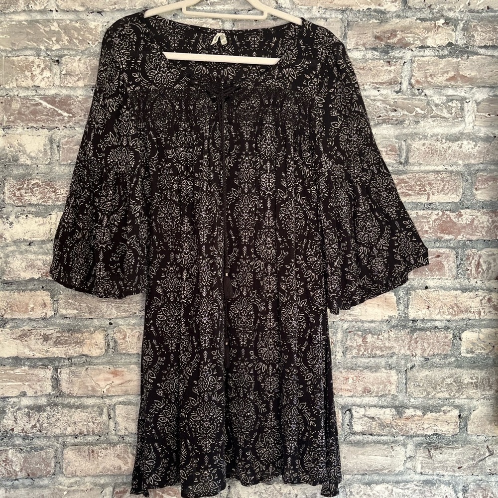 Perfect for everything dress, bell sleeves,criss cross cord tie Front like new